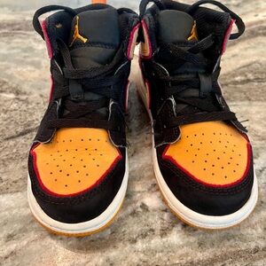Air Jordan Black and Orange High-Top Sneakers